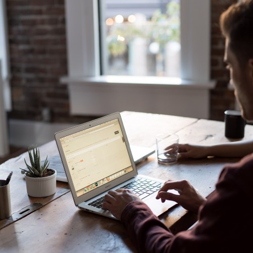 Man at a laptop in an office